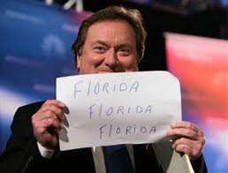 Tim Russet holds Florida Florida Florida sign